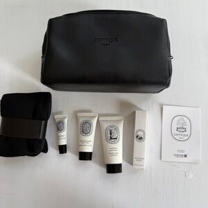 New Diptyque black & white amenity kit for Qatar Airways in Philosykos fragrance